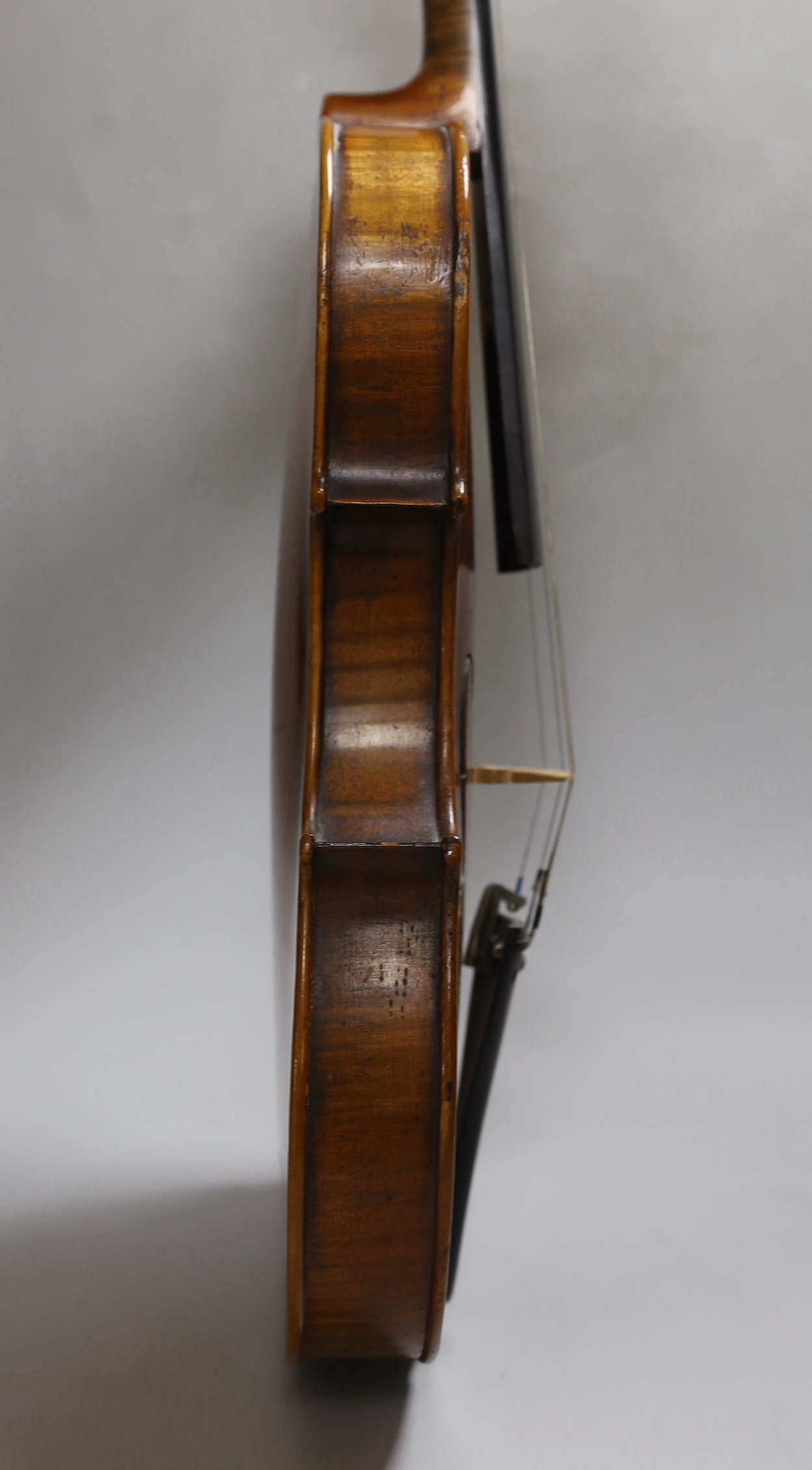 A Vuillaume violin with a bow, in case, back measures 36cm excl button